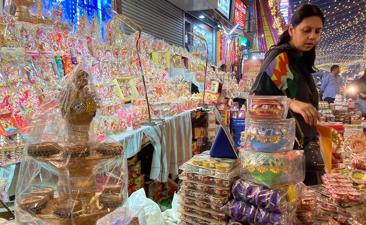 Streets are lined with stalls selling diyas, candles and clay idols of Lord Ganesh and Goddess Laxmi in the Lajpat Nagar Market.